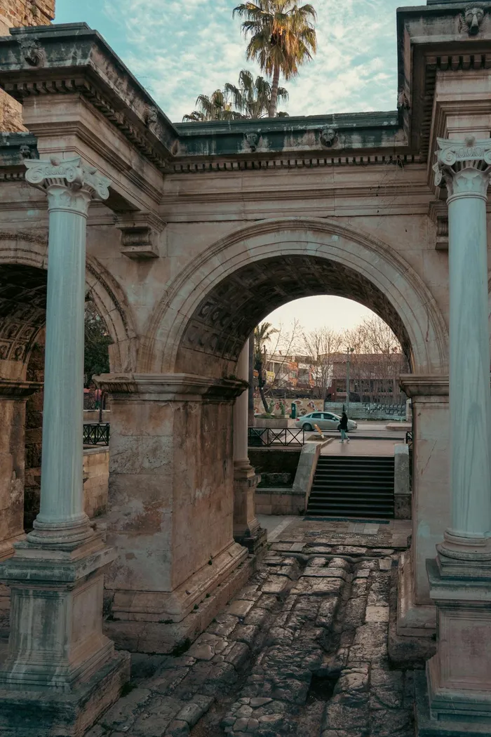 Hadrian's Gate in Antalya, Turkey — an iconic Roman landmark in a city that hosts world-class smile design clinics for UK patients